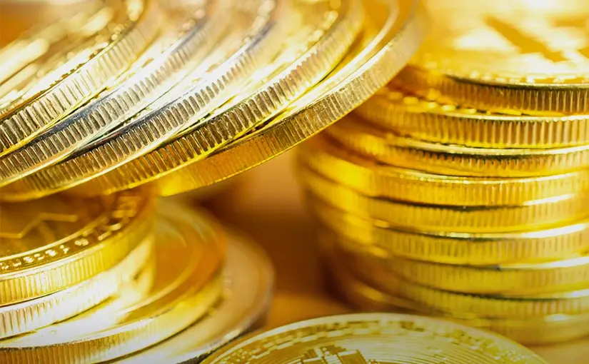 Gold Slips as Trade Hopes Rise and Risk Appetite Returns